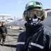 USS Theodore Roosevelt flight deck personnel hard at work