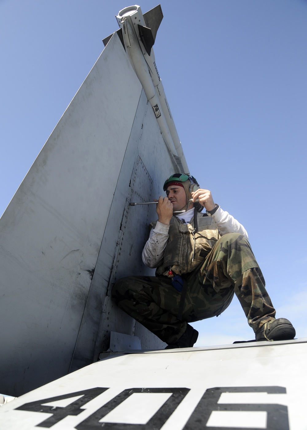 USS Theodore Roosevelt flight deck personnel hard at work