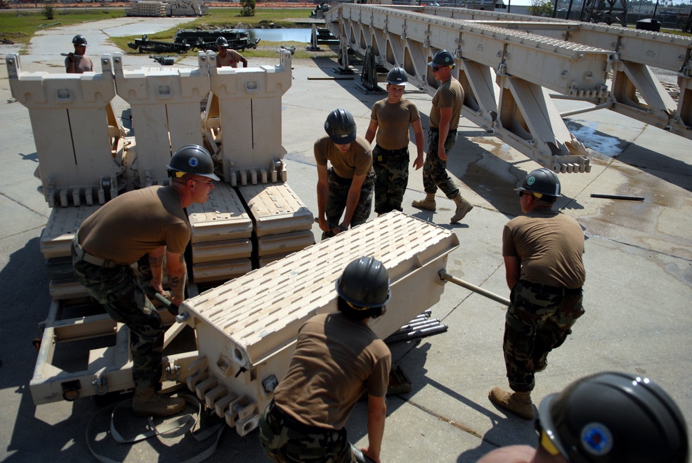 Seabees build bridges during contingency construction crew training