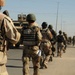 Iraqi Soldiers Distribute Information Pamphlets