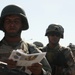 Iraqi Soldiers Distribute Information Pamphlets