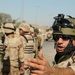 Iraqi Soldiers Distribute Information Pamphlets