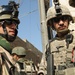 Iraqi Soldiers Distribute Information Pamphlets
