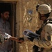 Iraqi Soldiers Distribute Information Pamphlets
