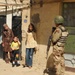 Iraqi Soldiers Distribute Information Pamphlets