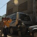 Iraqi Soldiers Distribute Information Pamphlets