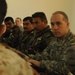 Iraqi Soldiers Distribute Information Pamphlets