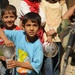 Iraqi Soldiers Distribute Information Pamphlets