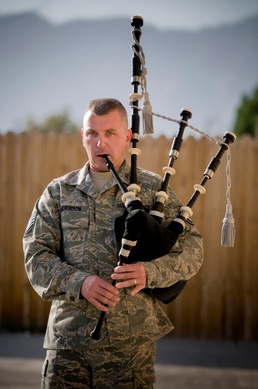 Airman Plays the Bagpipes in Honor of Fallen Comrades