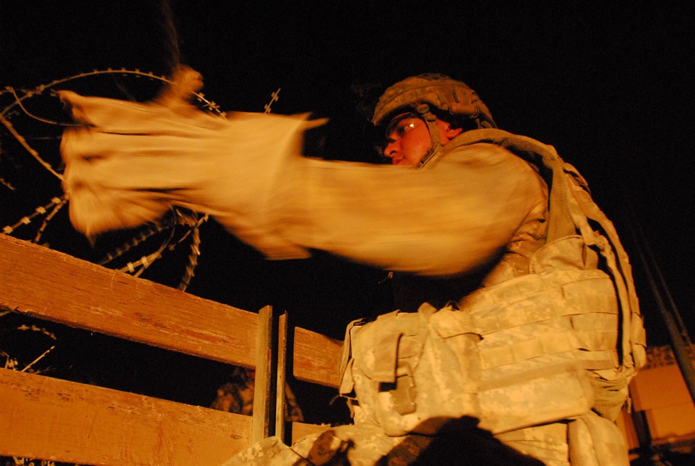 Regulars' Charlie Co. Soldiers remove C-Wire from West Rashid
