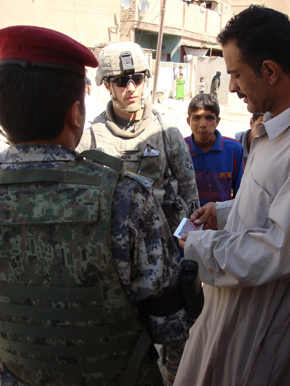 MND-B Soldiers, ISF inform residents of possible returning threats