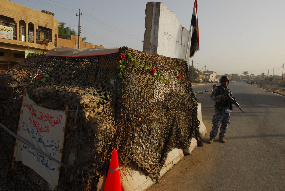 Iraqi national police patrol Hayy Aamel to disrupt, destroy enemy