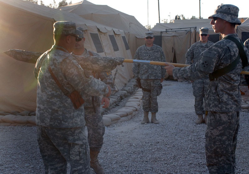 Warhorse's colors uncased at Camp Echo