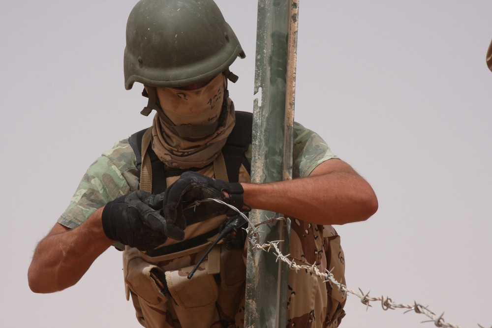 U.S. and Iraqi Soldiers Protect Locals