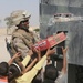 Troops distribute school supplies to Iraqi children