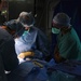 Doctors perform surgery, hernia operation aboard USS Kearsarge