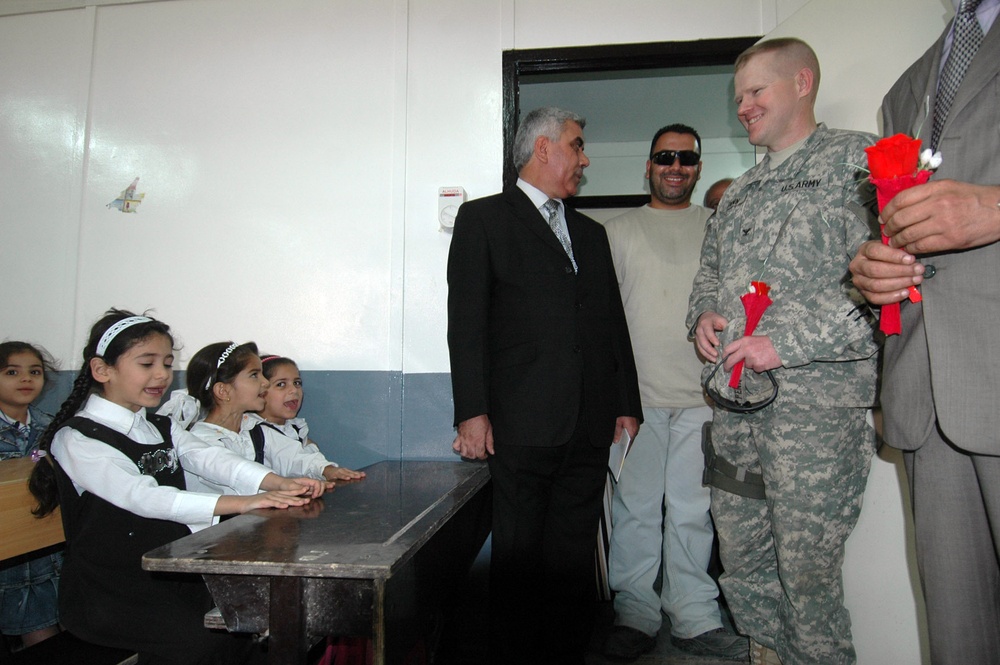 Soldiers Team With Local Officials to Help Improve Education for Local Students