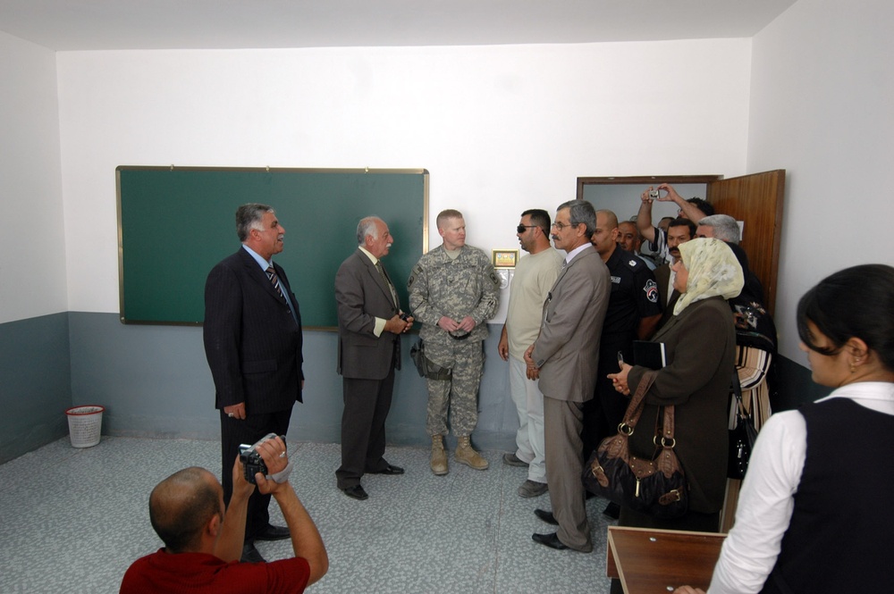 Soldiers Team With Local Officials to Help Improve Education for Local Students