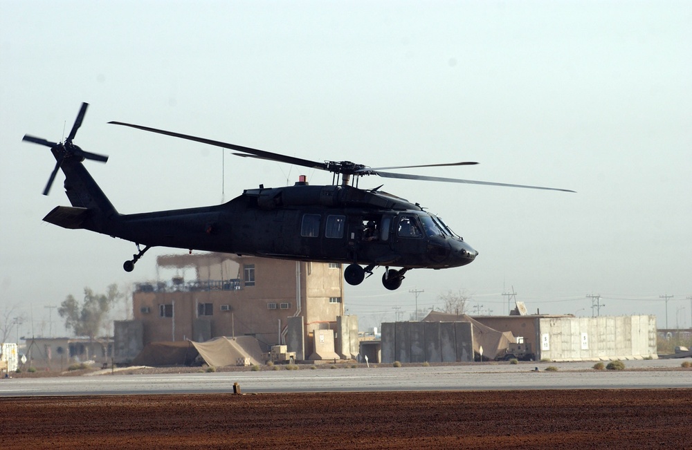 Blackhawk helicopter crew flying high over Baghdad