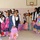 Iraqi national police distribute backpacks, smiles