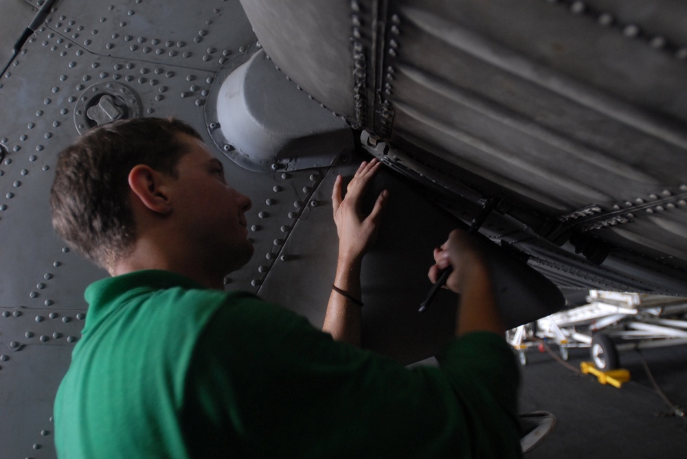 Maintenance checks in the hangar bay