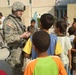 Soldiers distribute hope to Husayniyah children