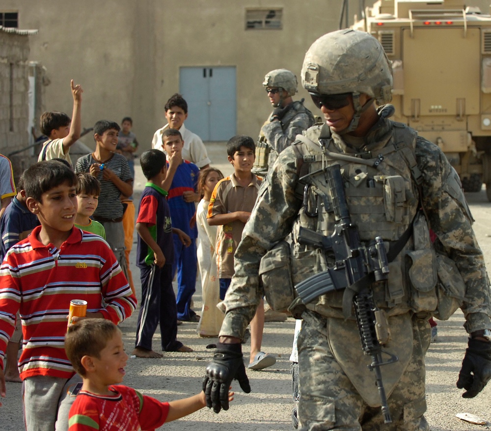 Near riot enriches lives of Iraqi children, Multi-National Division – Baghdad Soldiers