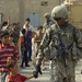Near riot enriches lives of Iraqi children, Multi-National Division – Baghdad Soldiers