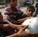 Near riot enriches lives of Iraqi children, Multi-National Division – Baghdad Soldiers