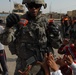 Near riot enriches lives of Iraqi children, Multi-National Division – Baghdad Soldiers