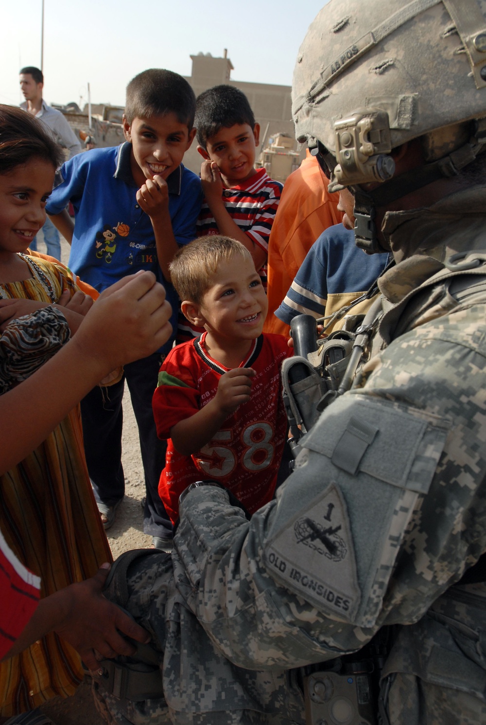 Near riot enriches lives of Iraqi children, Multi-National Division – Baghdad Soldiers