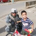 Bicycles put smiles on Iraqi chidrens' faces