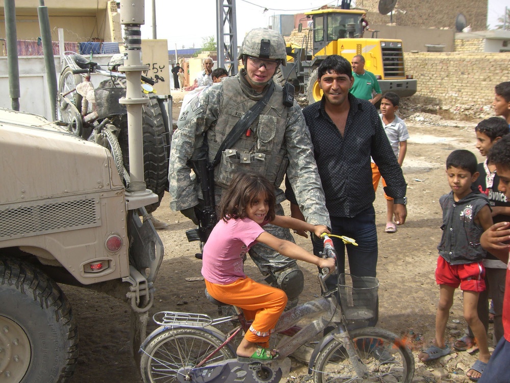Bicycles put smiles on Iraqi chidrens' faces