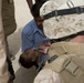 Corpsman saves life of drowning Iraqi boy