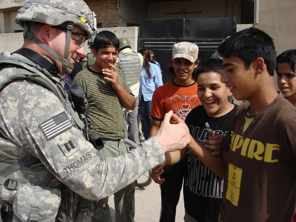 Iraqi security forces, Multi-National Division - Baghdad Soldiers patrol village in eastern Baghdad