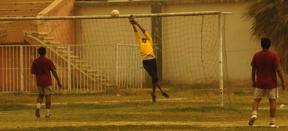 'Comrades in Arms' battle on the field - soccer field that is