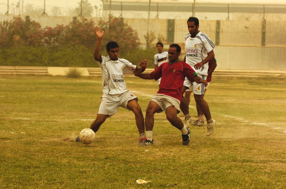 'Comrades in Arms' battle on the field - soccer field that is