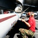 Loading missiles aboard the USS Theodore Roosevelt