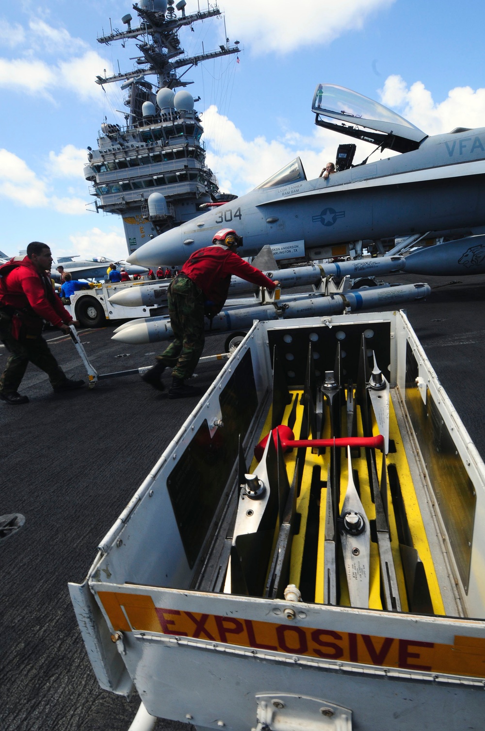 Loading missiles aboard the USS Theodore Roosevelt