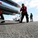 Loading missiles aboard the USS Theodore Roosevelt