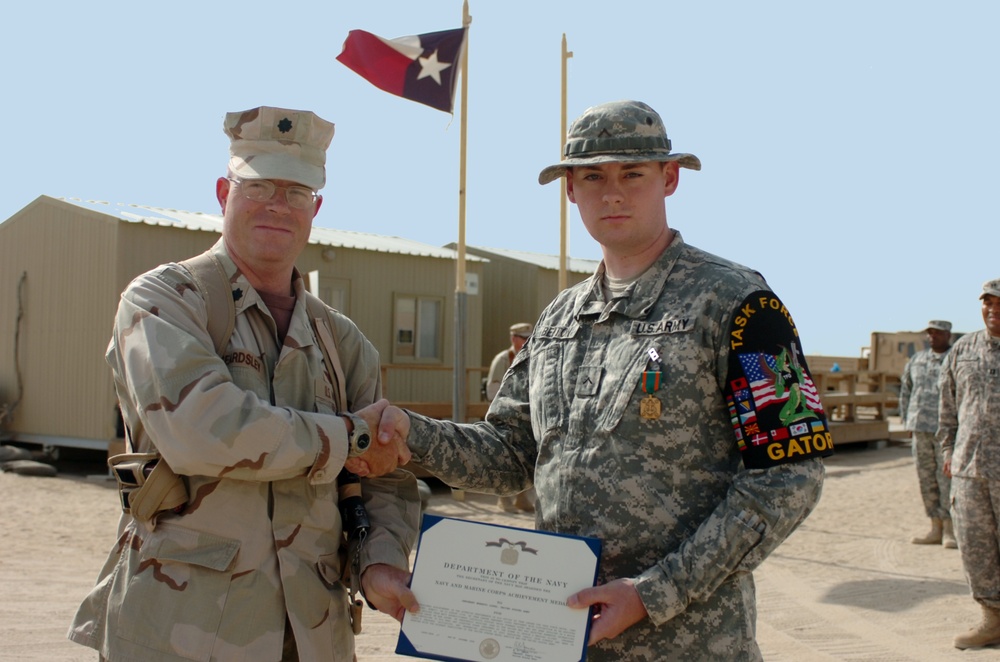 Soldiers receive the Navy/Marine Achievement Medal