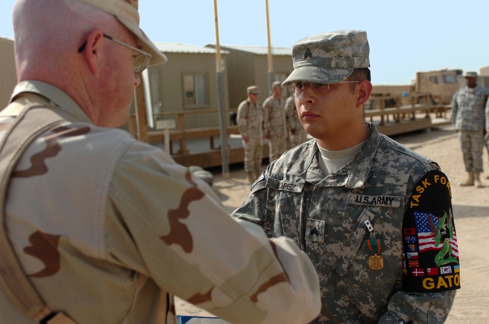 Soldiers receive the Navy/Marine Achievement Medal