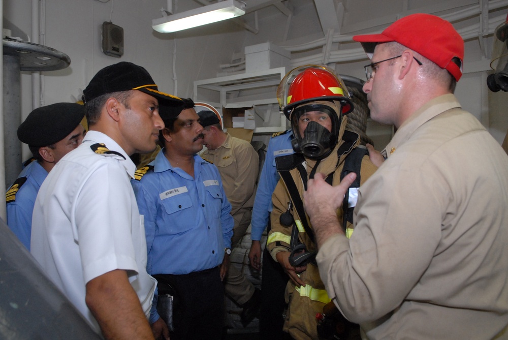 Indian navy sailors witness damage control drill aboard USS Thach