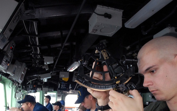 USS Chancellorsville, USNS Bridge, INS Godavari replenish at sea