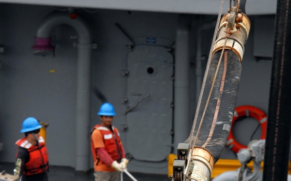 USS Chancellorsville, USNS Bridge, INS Godavari replenish at sea