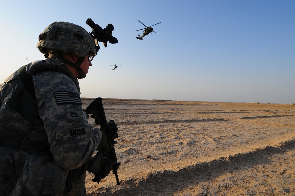 1st Brigade Combat Team, 101st Airborne Division Soldiers air assault into Iraqi village