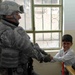 Iraqi, Coalition Soldiers Visit Elementary School