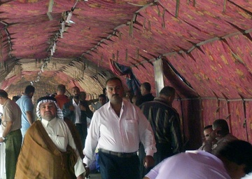 Rainy day doesn't stop flood of Iraqi business