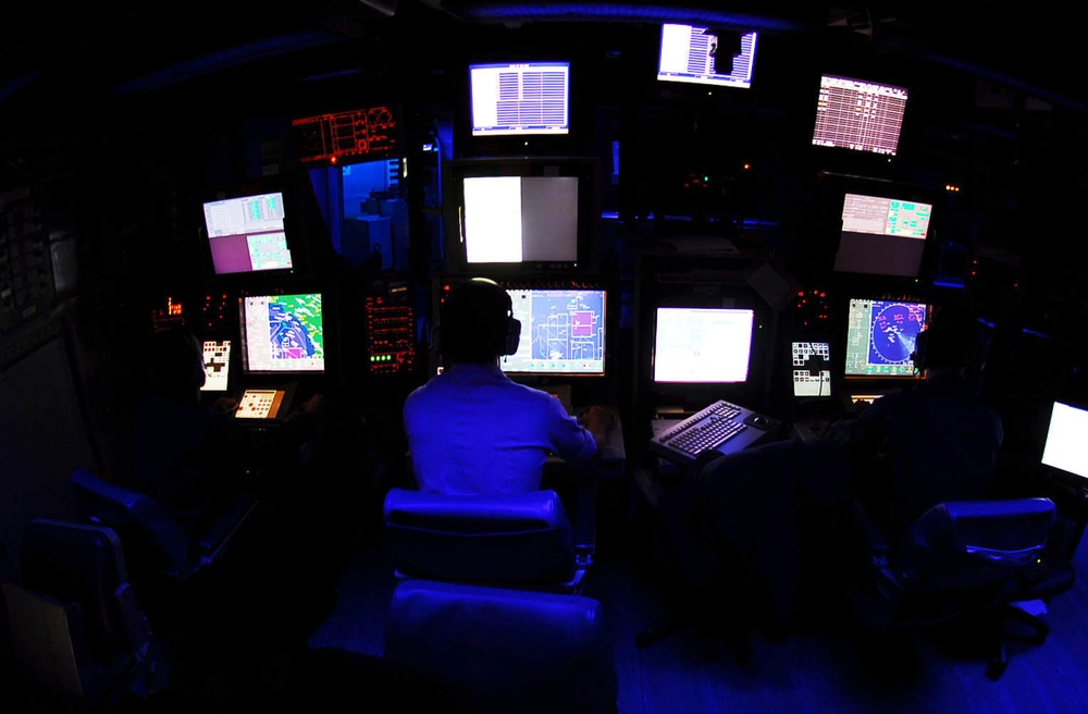monitoring air radar contacts aboard USS John C. Stennis