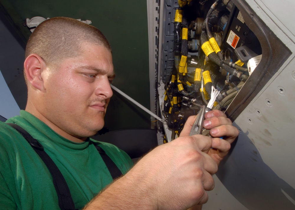 Repairing a wire on a Super Hornet